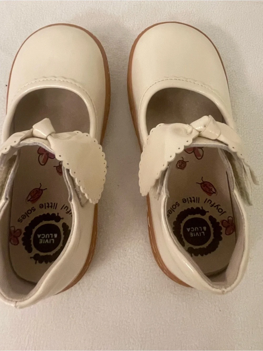 Livie & Luca Cream Patent Mary Jane Shoes with Bow Strap